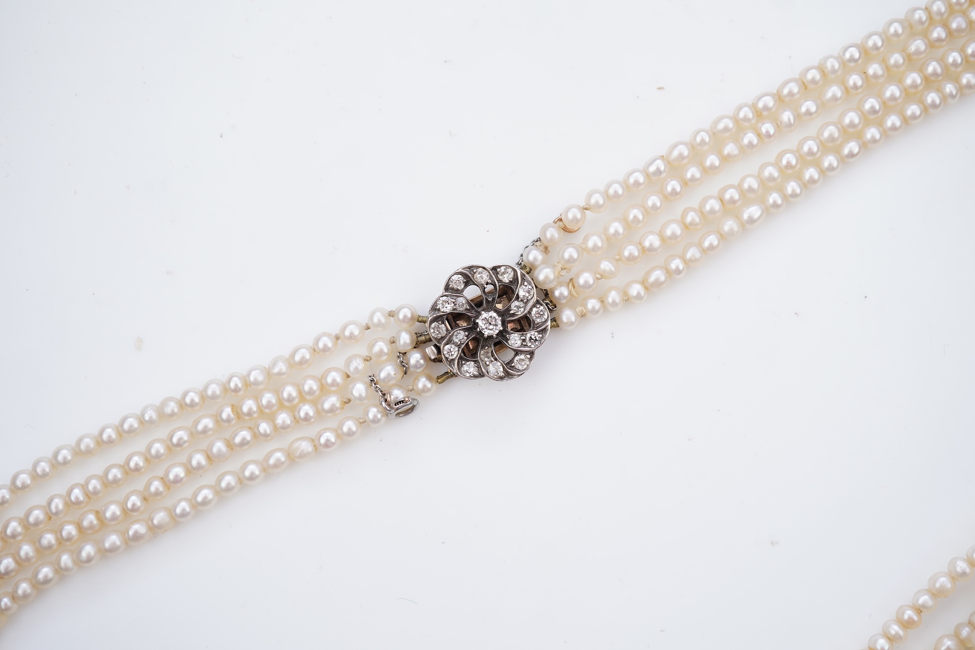 A pearl and diamond necklace, 19th century and later